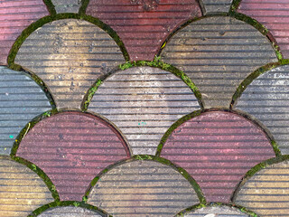 Colored scaly paving stones.