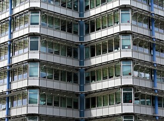 Perfect simmetry in a office building with beautiful glass windows 