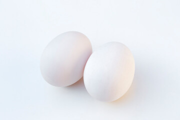 Fresh duck eggs on white background.