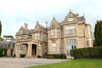 Fototapeta na wymiar Muckross House, castle at Killarney Park in Ireland 