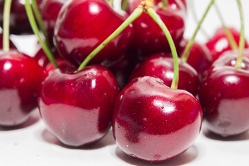 close up ripe cherries on a white background