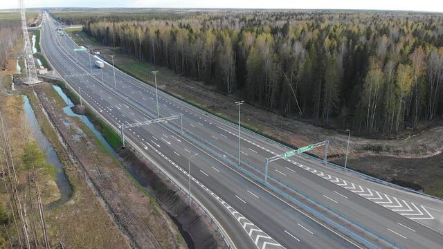 Aerial view of Moscow - Saint Petersburg motorway toll road, Russian federal highway in the European part of Russia, parallel to the M10 highway, from the federal cities of Moscow to St. Petersburg.
