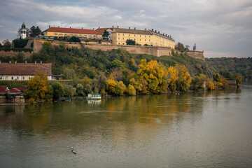 Fototapeta na wymiar Historical Petrovaradin fortress in Serbia on the banks of the Danube, beautiful autumn landscape