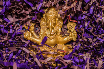 golden statuette of the indian god Ganesha