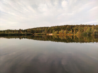 Fototapeta premium Lake and forest in sunset, picturesque wallpaper