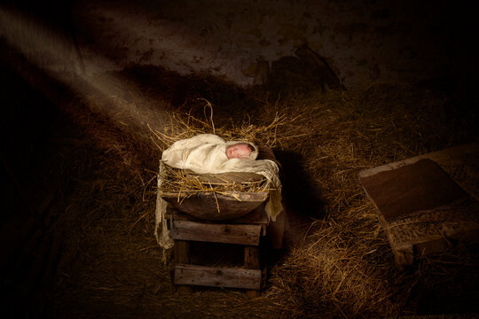 Jesus doll in the manger with christmas
