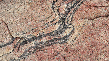 Background texture, stone surface, pink abstract pattern with black splashes