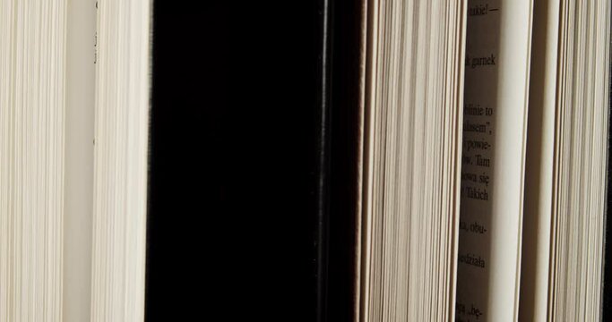 rotating beautiful old books with black and brown covers
