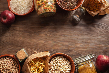 still life with dry pasta beans and legumes in ecological storage zero waste concept