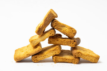 Fototapeta na wymiar A pile of bread rusks toast biscuit isolated on a white background