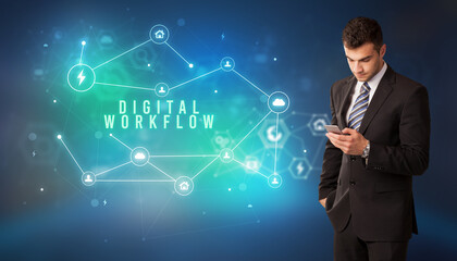 Businessman in front of cloud service icons with DIGITAL WORKFLOW inscription, modern technology concept