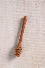 honey dipper on a white background