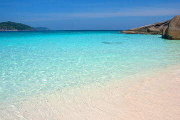 Fototapeta na wymiar clear turquoise water on the beach on the Similan Islands in the Andaman Sea. Journey. Asia