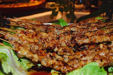 Chicken slices in skewers, chicken barbeque in sauce