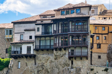 Fototapeta na wymiar Wooden balconies in the famous hanging houses of the city of Cuenca, Castilla la Mancha, Spain