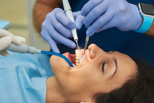 Dentists performing dental treatment