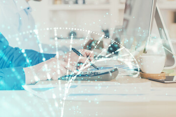 DNA hologram with businessman working on computer on background. Concept of bioengineering. Double exposure.