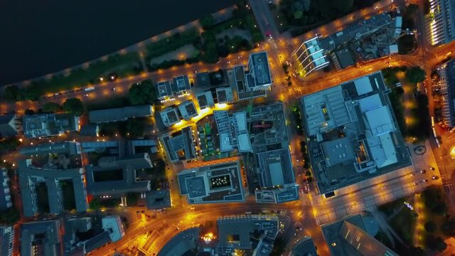 Hyper Lapse Time Lapse of Frankfurt am Main, Germay Night City traffic with orange lit streets, Aerial Birds Eye Overhead Top Down View