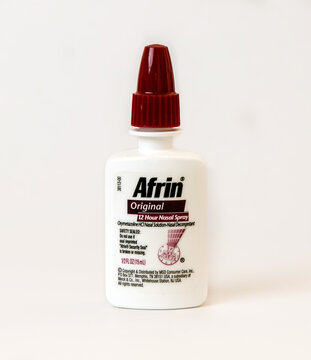 A small bottle of Afrin isolated on white.