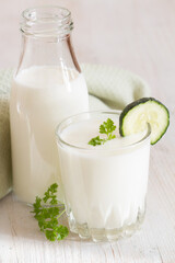 Probiotic kefir drink in glass, gut health concept