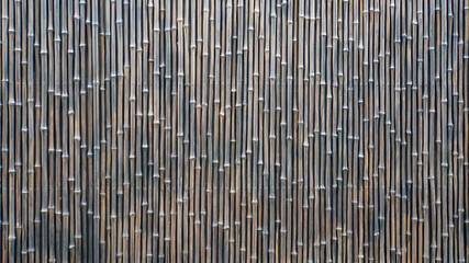 敷き詰められた細い竹模様の背景素材