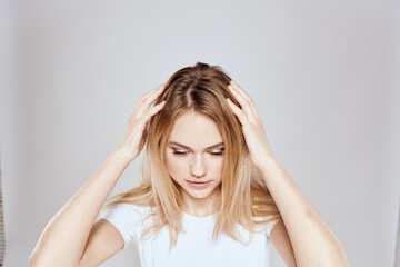 Fototapeta premium emotional blonde white t-shirt close-up studio lifestyle fun