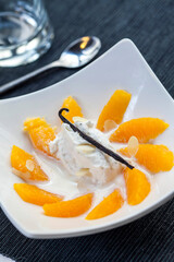 Orange wedges with vanilla yoghurt