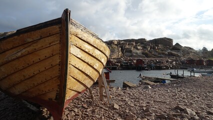 A wooden boat on the ocean coast in southern Sweden
