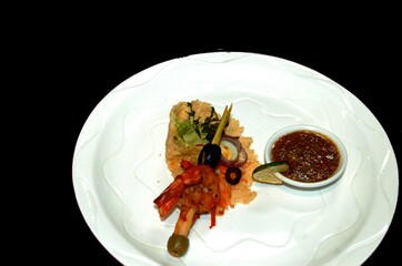 Tasty shrimp salad appetizer with a dip