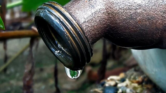 Faucet with water drops - Nature