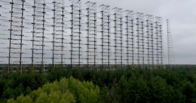 Drone Flying Towards Rusty Duga Antenna Near Chernobyl In Ukraine - aerial ascending