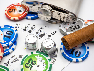 playing cards, poker chips, alcohol shot bottle,  cigar, addiction vices concept 