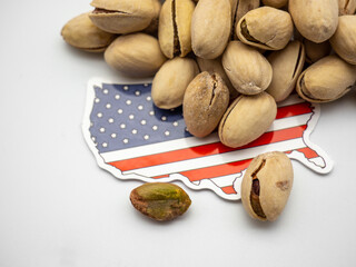 pistachio and us flag on white commerce export concept