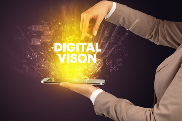 Close-up of a touchscreen with DIGITAL VISON inscription, innovative technology concept