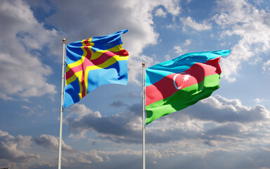 Beautiful national state flags of Azerbaijan and Aland Islands together at the sky background. 3D artwork concept.