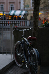 Obraz premium Bike parked on the tree at night in Slovenia