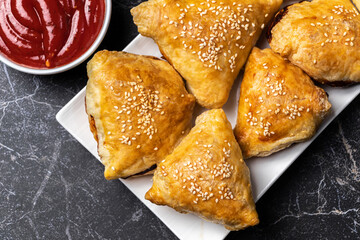 Samsa or samosas with meat. Traditional eastern food. Uzbek cuisine