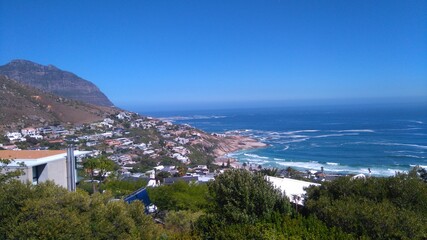 Fototapeta na wymiar view of Llandudno Beach and neighborhood in Cape Town, South Africa.