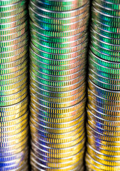 coins of silver color illuminated with yellow green color