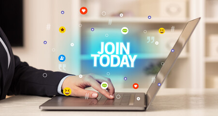 Freelance woman using laptop with JOIN TODAY inscription, Social media concept