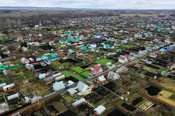 Dachas and summer cottages in the suburbs. Aerial view.