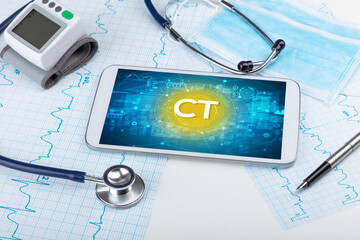 Close-up view of a tablet pc with CT abbreviation, medical concept