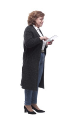 in full growth. mature woman with a digital tablet.