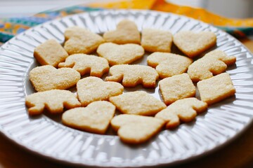 Close-up of a beautiful crumbly shortbread on a large plate