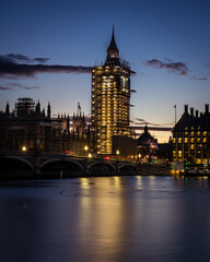 Fototapeta premium Big Ben clock tower under scaffolding at sunset