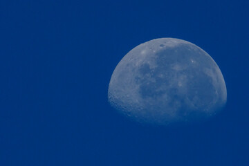 close up moon on blue sky