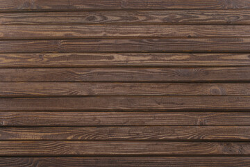 Naklejka premium Brown wooden planks desk table background texture. Top view with copy space for text and any design.