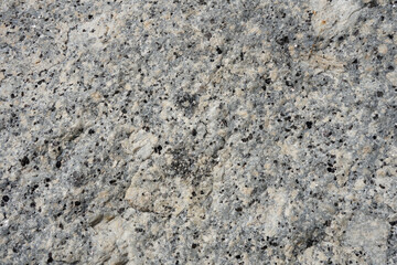 Natural stone grey granite texture and background.  Biotite Granite rock texture.