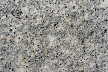 Natural stone grey granite texture and background.  Biotite Granite rock texture.