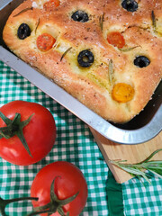 Italian Focaccia Bread (with cherry tomatoes, black olives, olive oil and rosemary)